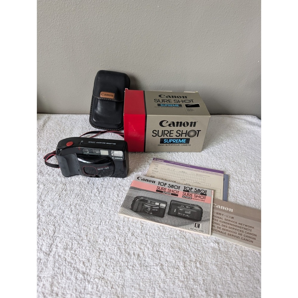 Canon Sure Shot Supreme 35mm Camera Autofocus w/OEM Box Manual Needs Battery